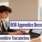Bank of Baroda Apprentice Recruitment 2025 featured image showing a young professional working on a laptop in a modern office with text highlighting 2700 apprentice vacancies eligibility stipend and exam details